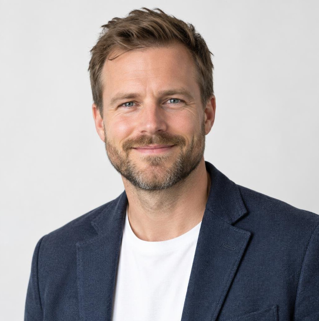 Norwegian man with beard smiling, studio portrait